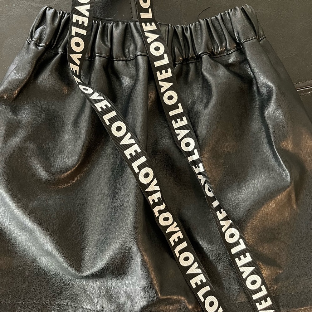 2 skirts with a hat and belt